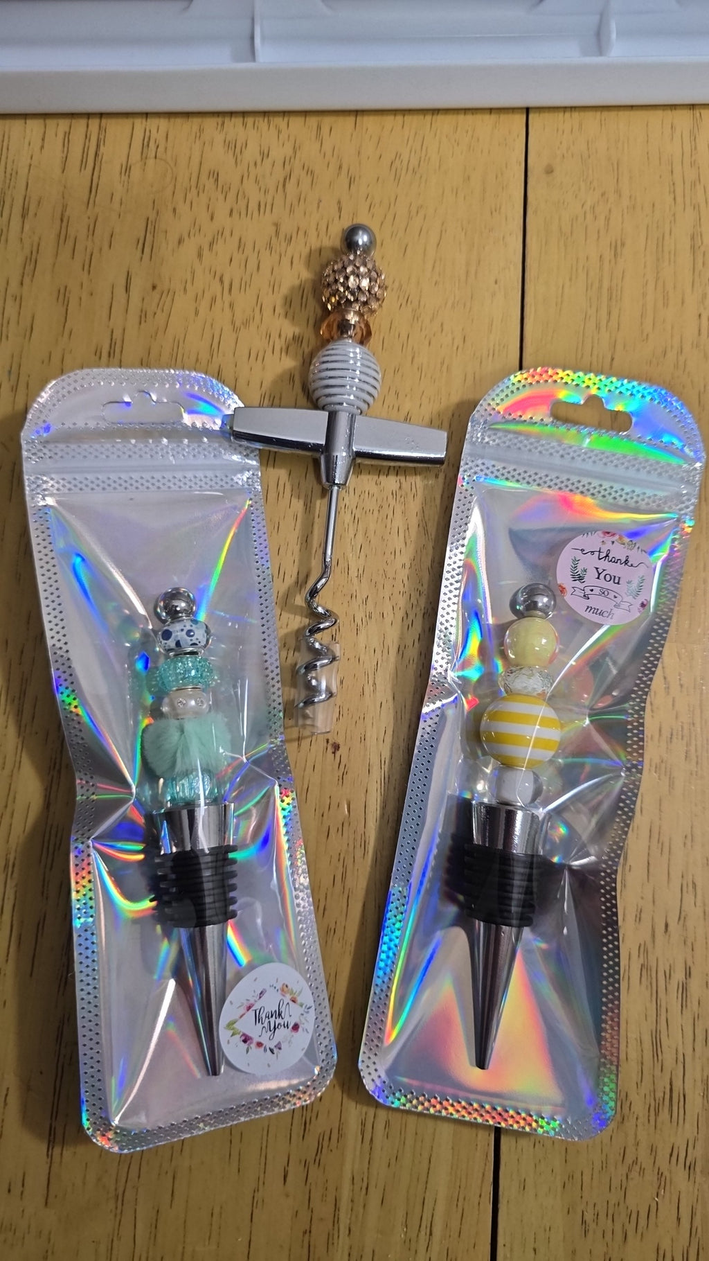 Bubblegum beaded wine stoppers and bottle opener